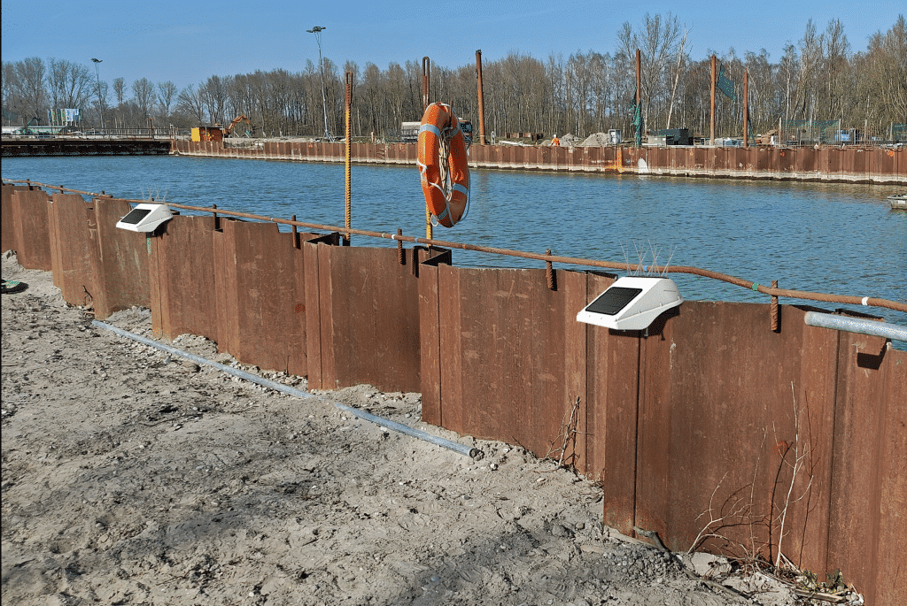 Basetime Locator One devices supporting sheet pile monitoring along the River Rotte during A16 Rotterdam motorway construction, tracking horizontal deformation.