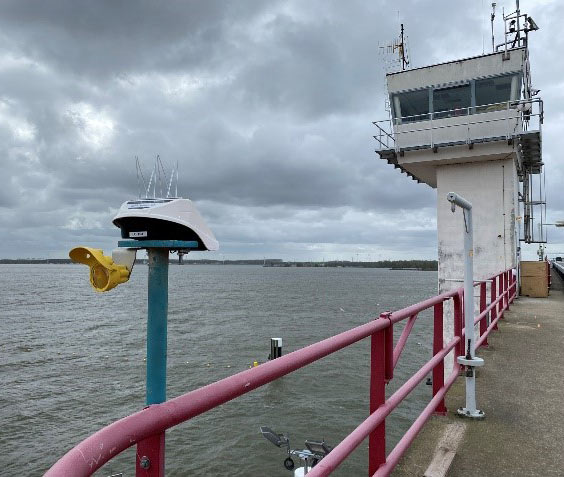 Locator Ones on the shores of Germany. Locator One, Basetime's autonomous measurement device, on a survey marker for precise soil settlement measurements