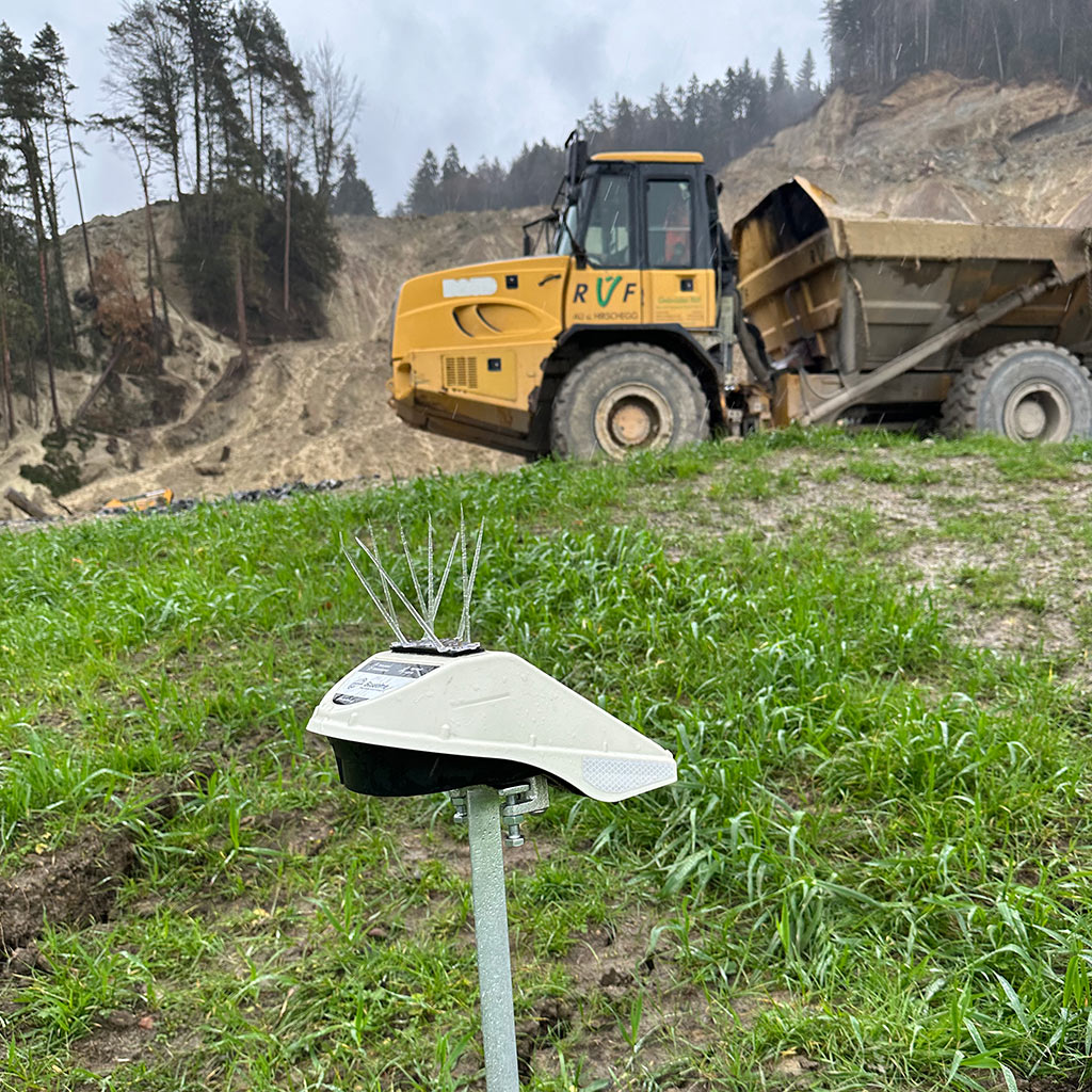 Locator Ones on the shores of Germany. Locator One, Basetime's autonomous measurement device, on a survey marker for precise soil settlement measurements