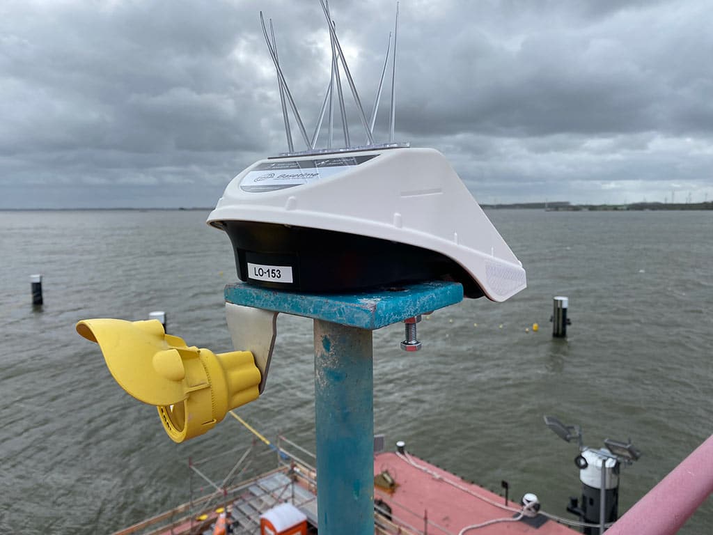 Locator Ones on the shores of Germany. Locator One, Basetime's autonomous measurement device, on a survey marker for precise soil settlement measurements