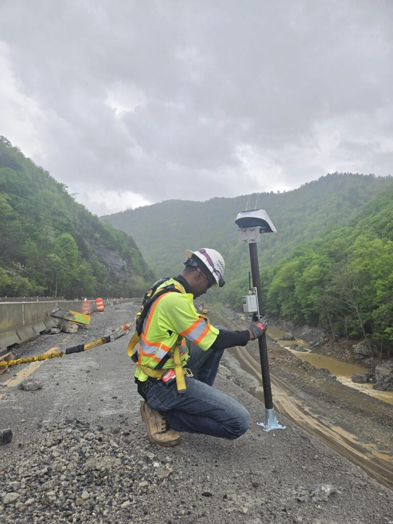 Basetime GNSS monitoring device tracking landslide movement on the I-40 slope in Asheville, North Carolina.